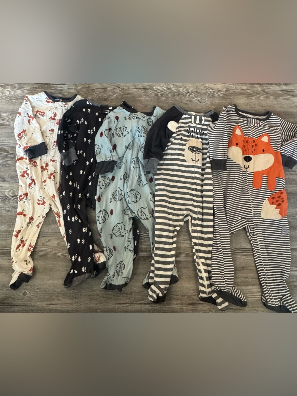 Gerber Multi-Pack Baby Footed One-Pieces in Black, White, Gray & Blue